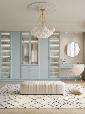 Vestidor azul moderno a medida con puertas de vidrio y distribución de almacenamiento para dormitorio