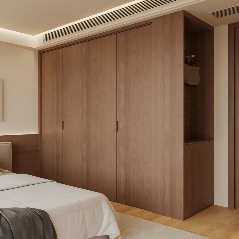 Armario minimalista de madera con puertas plegables y paneles de longitud completa, para lograr un aspecto despejado en la habitación.