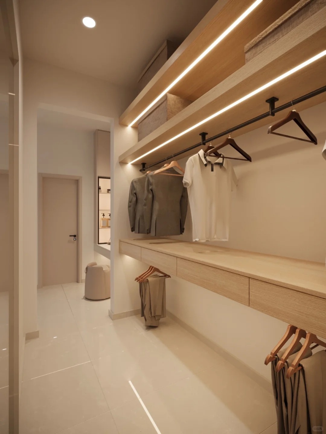 Luxury open wardrobe design with premium glass shelves, accessory drawers, and built-in ambient lighting for contemporary master suites.