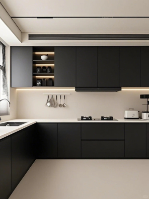 Armoires de cuisine modernes noir mat avec design sans poignées et ferrures à fermeture douce pour projets immobiliers multifamiliaux