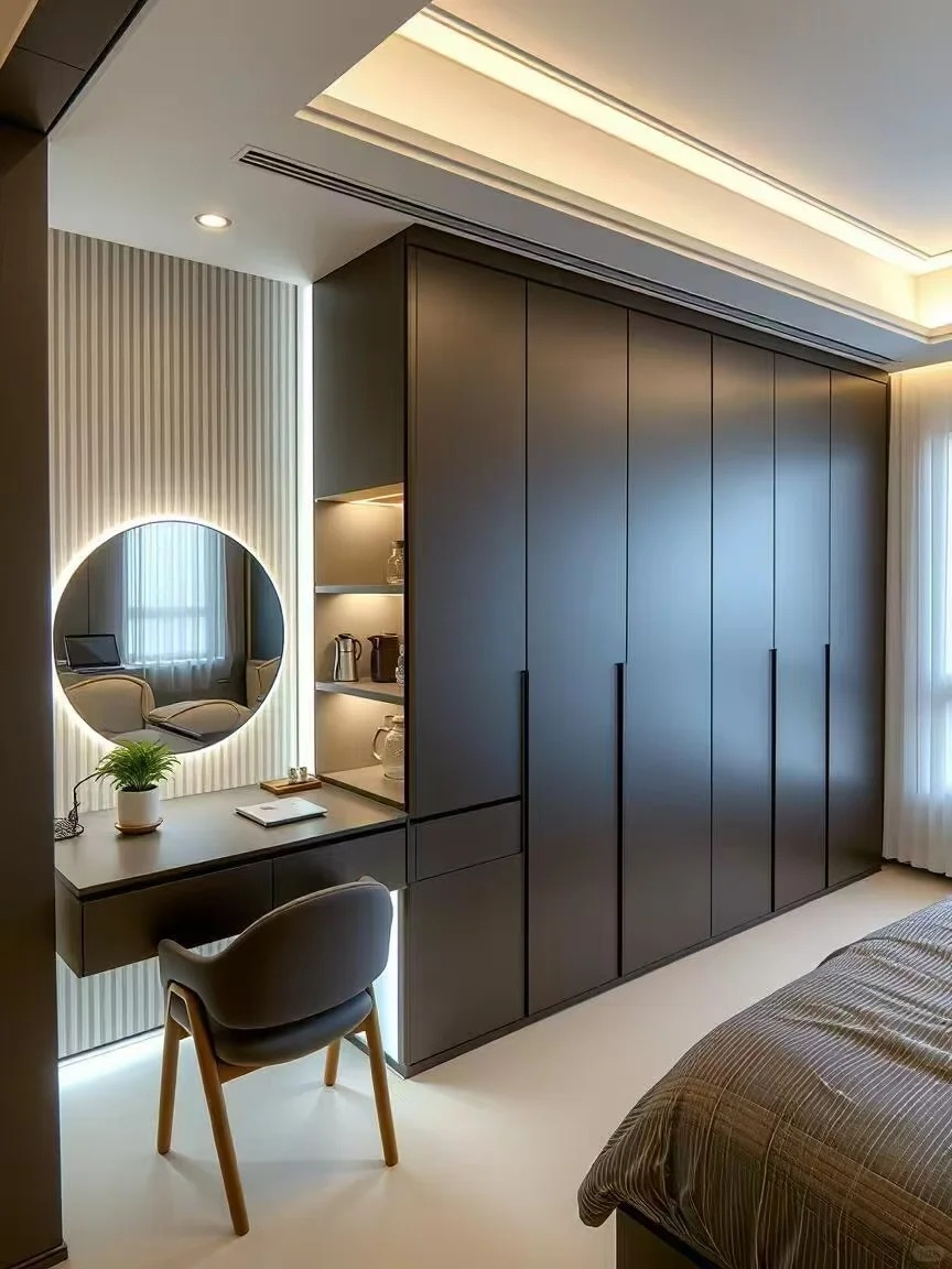 Luxury grey wardrobe closet paired with a minimalist vanity station and smart LED accent lighting for modern interior designs.